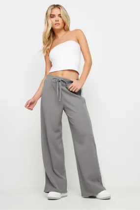 PixieGirl Petite - Pantaloni larga A righe con laccetti laterali